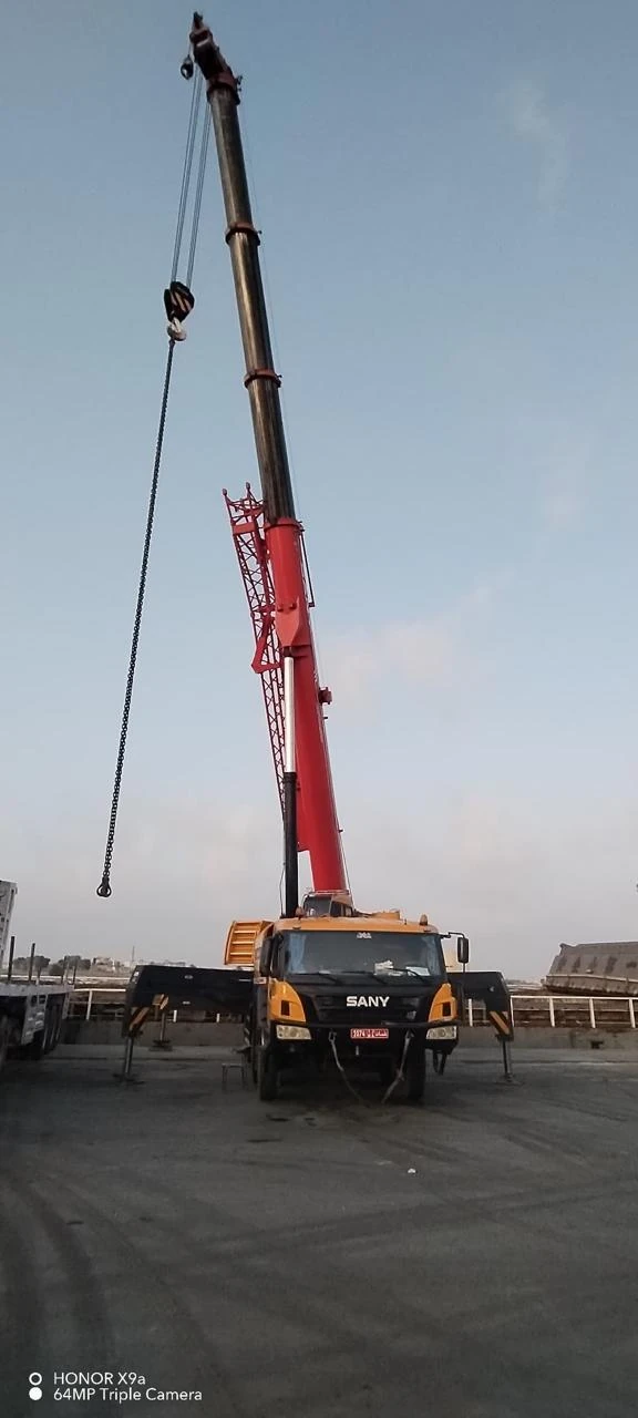 Crane with extended boom